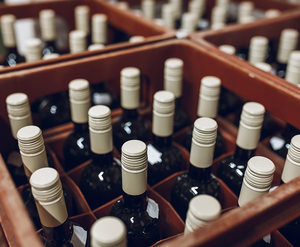 Wine bottles in crates, ready for shipment.